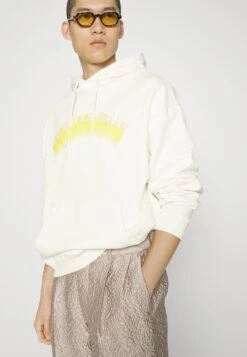 FIORUCCI Flocked Arch Logo Hoodie - Sweater - Cream -Algemene Winkel Voor Herenmode 74313c143a1b463c9d6e21015ce7eb03
